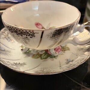 Vintage 3 footed tea cup made in Japan roses with silver guild. Rare!